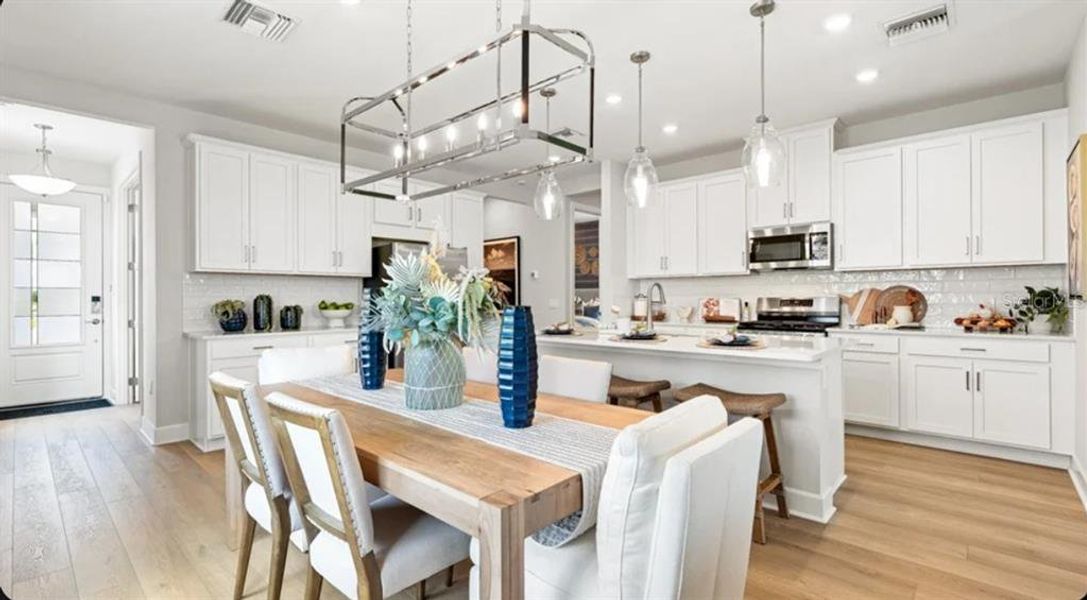 Furnished interior view inside a new home in Esplanade at Wellen Park, Englewood (Image 4).