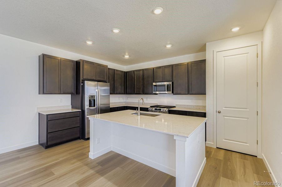 Furnished interior view inside a new home in Newlin Crossing: The Monarch Collection, Parker (Image 9). Furnished interior view inside a new home in Newlin Crossing: The Monarch Collection, Parker (Image 9).