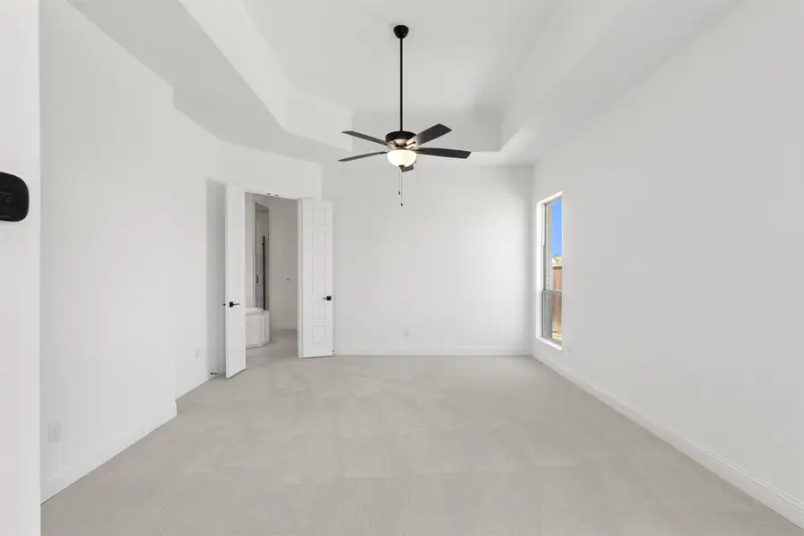Representative unfurnished interior of a home built from the Newport by Windsor Homes in Nelson Lake Estates, Rockwall (Image 22).