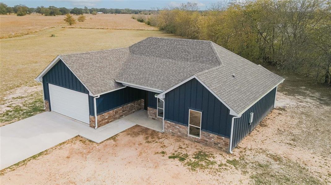 Front exterior of a new home in , Mount Vernon, TX, highlighting curb appeal (Image 1). Front exterior of a new home in , Mount Vernon, TX, highlighting curb appeal (Image 1).