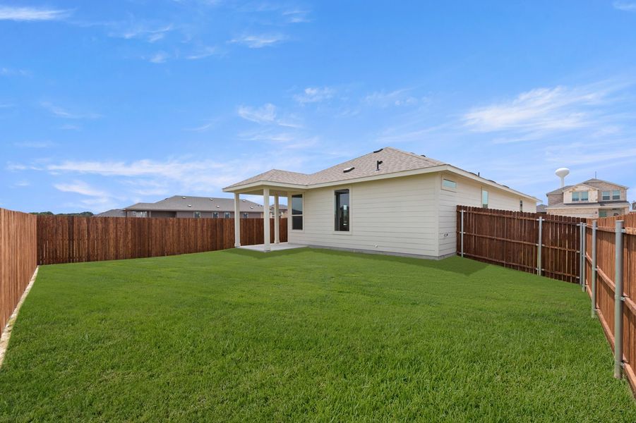 Front exterior of a new home in Creekside Ranch, Blue Ridge, TX, highlighting curb appeal (Image 21). Front exterior of a new home in Creekside Ranch, Blue Ridge, TX, highlighting curb appeal (Image 21).