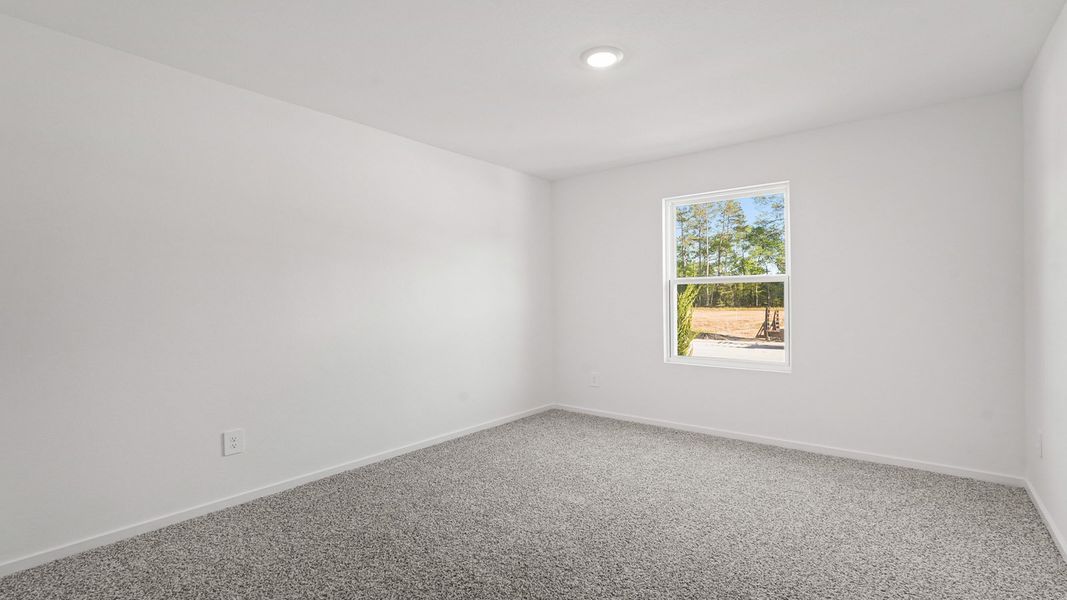 Representative unfurnished interior of a home built from the Denton by D.R. Horton in New Waverly Station, New Waverly (Image 16).