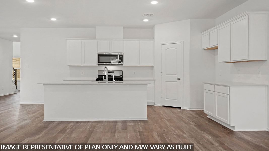 Furnished interior view inside a new home in Sunterra, Katy (Image 5).