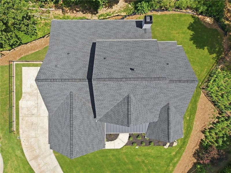 Front exterior of a new home in , Flowery Branch, GA, highlighting curb appeal (Image 29). Front exterior of a new home in , Flowery Branch, GA, highlighting curb appeal (Image 29).