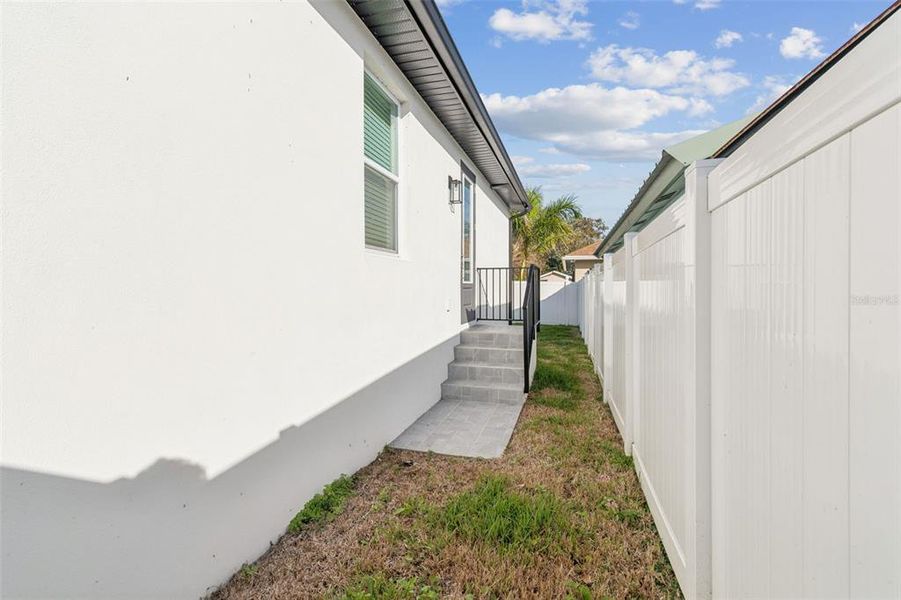 Exterior details and patio area of a home in , Tampa (Image 37).