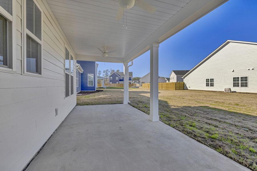 Exterior details and patio area of a home in Grand Park, Leland (Image 3).