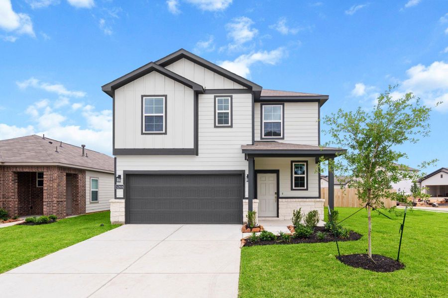 Front exterior of a new home in Laurel Farms, Brookshire, TX, highlighting curb appeal (Image 1). Front exterior of a new home in Laurel Farms, Brookshire, TX, highlighting curb appeal (Image 1).
