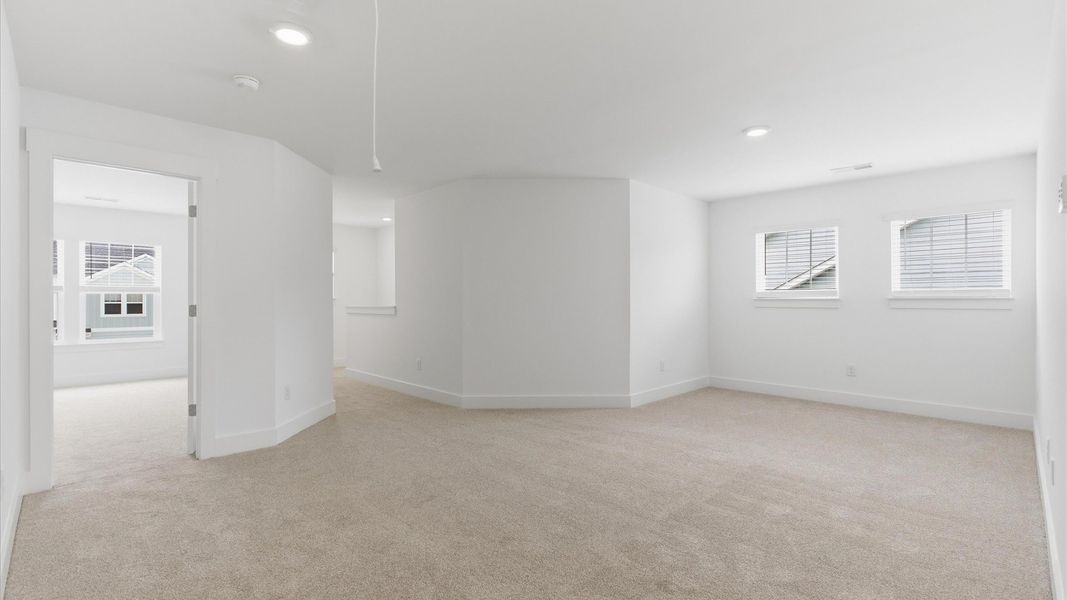 Furnished interior view inside a new home in Village at Midway, Anderson (Image 24).