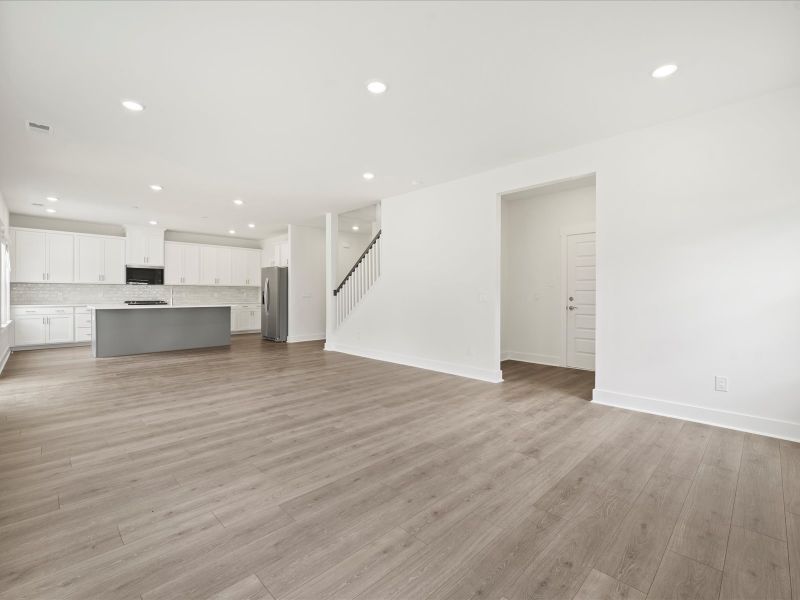 Spacious, unfurnished interior of a new home in The Coves at Lakes of Cane Bay, Summerville (Image 23).