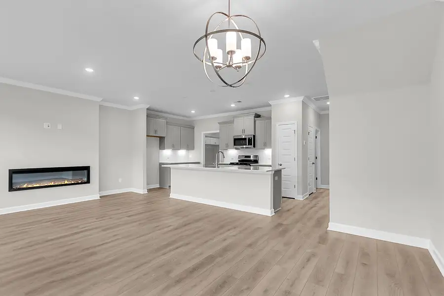 Spacious, unfurnished interior of a new home in Pineland Preserve, Summerville (Image 23).