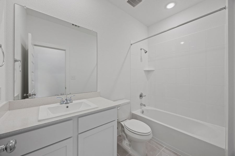 Bathroom in the Colorado home plan by Trophy Signature Homes – REPRESENTATIVE PHOTO Bathroom in the Colorado home plan by Trophy Signature Homes – REPRESENTATIVE PHOTO