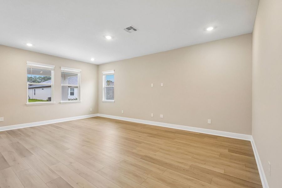 Spacious, unfurnished interior of a new home in Legends Preserve - Signature Series, Daytona Beach (Image 11).