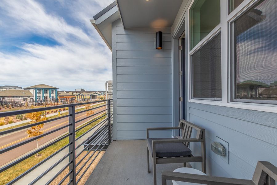 Exterior details and patio area of a home in The Commons at Victory Ridge, Colorado Springs (Image 26).