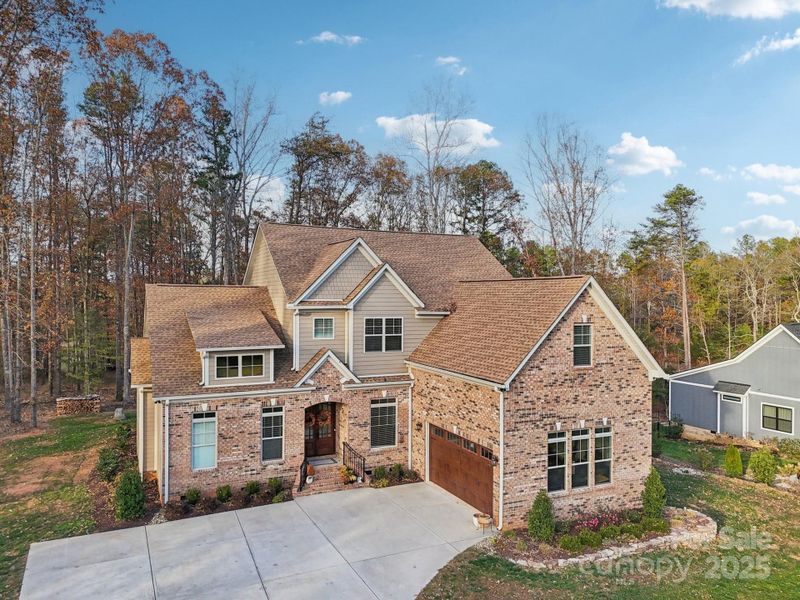 Front exterior of a new home in , Clover, SC, highlighting curb appeal (Image 21).