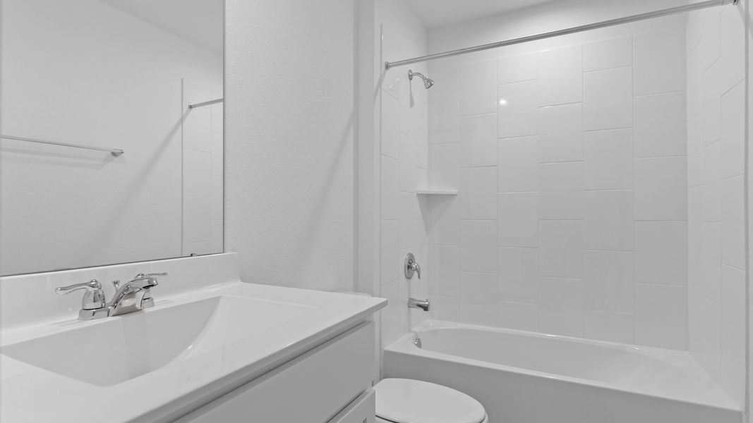 Furnished interior view inside a new home in Tamarron, Fulshear (Image 12).