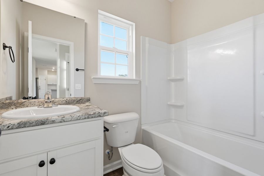 Representative furnished interior of a home built from the The Screven by RTS Homes in Tibet Road at Sassafras, Allenhurst (Image 17).