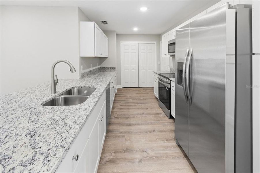 Furnished interior view inside a new home in , Frostproof (Image 6).