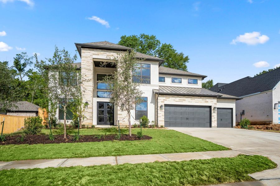 Front exterior of a new home in Briarley, Montgomery, TX, highlighting curb appeal (Image 27).