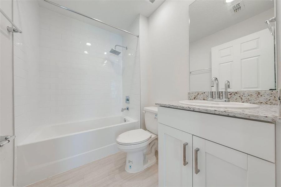 Furnished interior view inside a new home in , Kissimmee (Image 9).