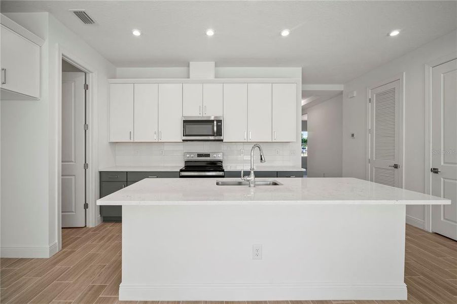 Furnished interior view inside a new home in Fieldstone, Plant City (Image 6). Furnished interior view inside a new home in Fieldstone, Plant City (Image 6).