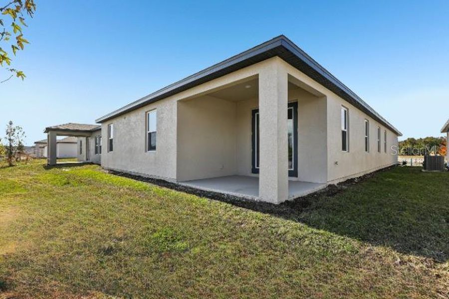 Exterior details and patio area of a home in Hawks Run, Kissimmee (Image 16). Exterior details and patio area of a home in Hawks Run, Kissimmee (Image 16).