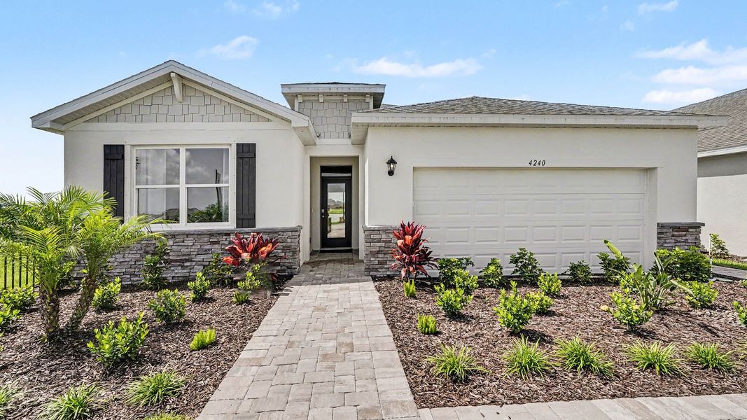 Representative exterior photo of a completed home built from the Delray by D.R. Horton in Cypress Bay West, Palm Bay, FL (Image 1). Representative exterior photo of a completed home built from the Delray by D.R. Horton in Cypress Bay West, Palm Bay, FL (Image 1).