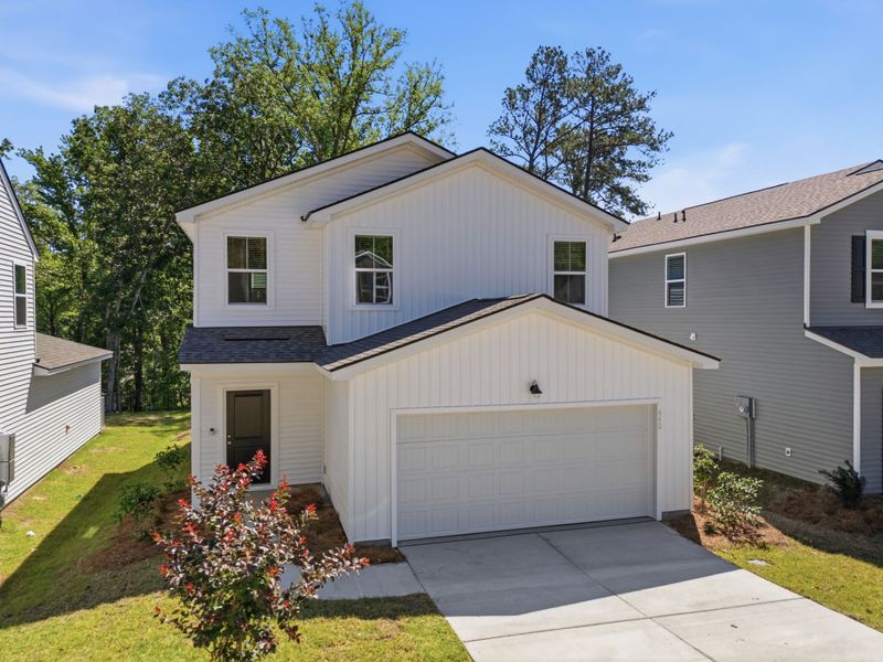 Front exterior of a new home in Grand Arbor, Blythewood, SC, highlighting curb appeal (Image 17).