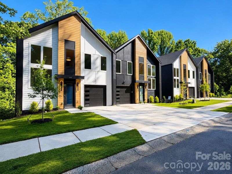 Front exterior of a new home in , Charlotte, NC, highlighting curb appeal (Image 1). Front exterior of a new home in , Charlotte, NC, highlighting curb appeal (Image 1).