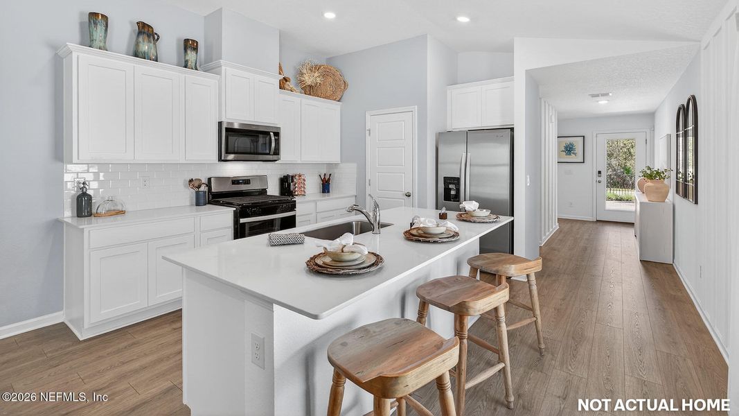 Furnished interior view inside a new home in Grand Reserve, Bunnell (Image 6).