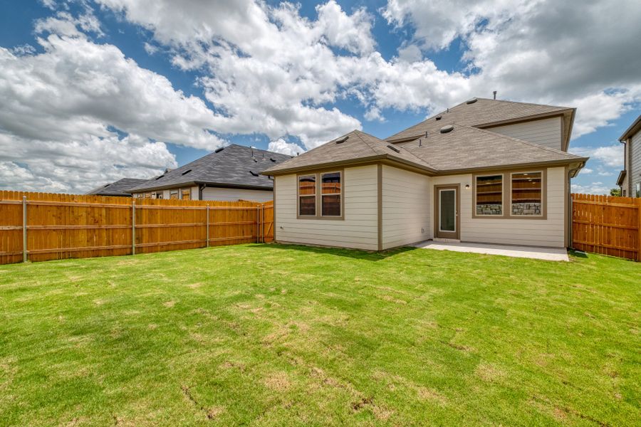 Exterior details and patio area of a home in Trinity Ranch, Elgin (Image 21).