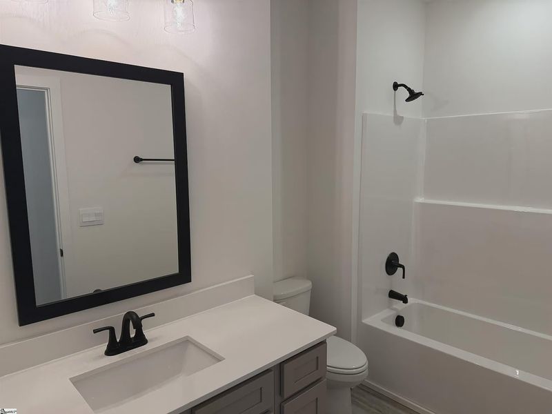 Furnished interior view inside a new home in Hidden Lake Estates, Greenville (Image 3).