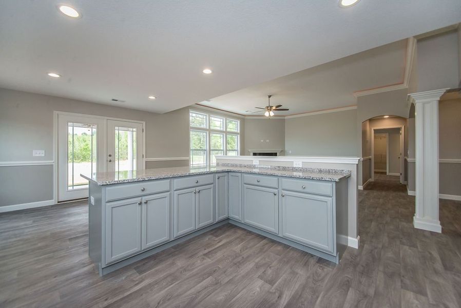 Representative furnished interior of a home built from the Beaumont by Enchanted Homes in Guadalupe Heights, Seguin (Image 12).