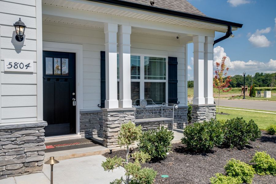 Front exterior of a new home in Wheatfield, Shelbyville, TN, highlighting curb appeal (Image 19).