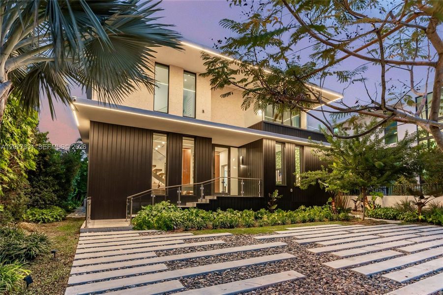 Front exterior of a new home in , Miami Beach, FL, highlighting curb appeal (Image 2). Front exterior of a new home in , Miami Beach, FL, highlighting curb appeal (Image 2).