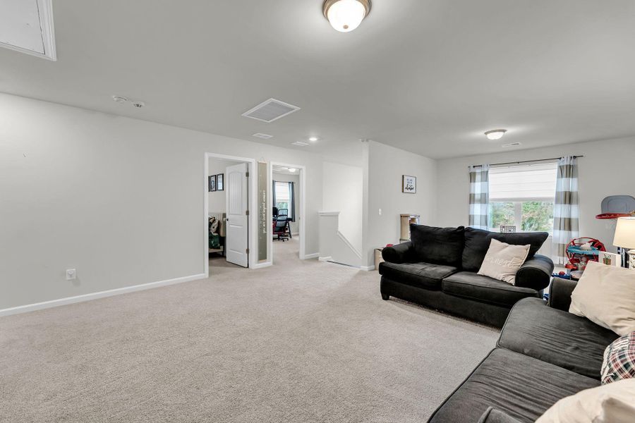 Furnished interior view inside a new home in Cordgrass Landing, Johns Island (Image 31).