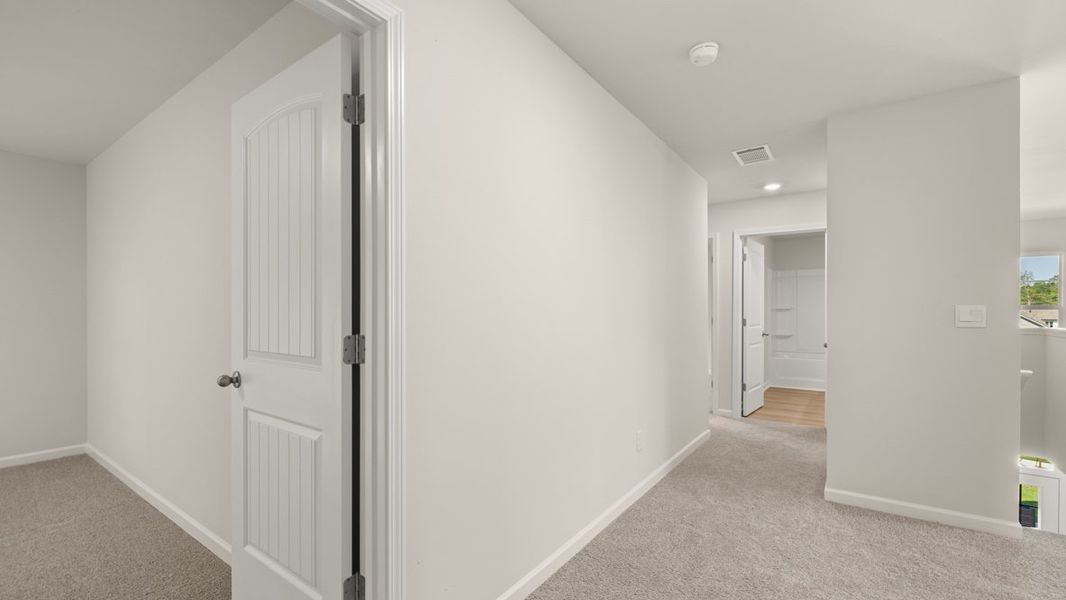 Representative unfurnished interior of a home built from the Elle by D.R. Horton in South Wind, South Fulton (Image 28).