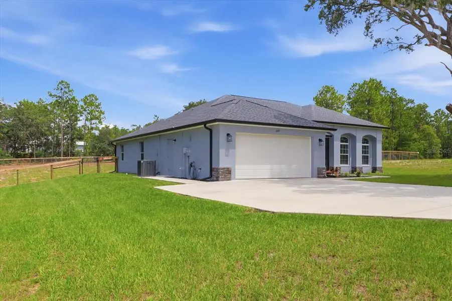 Front exterior of a new home in , Beverly Hills, FL, highlighting curb appeal (Image 2). Front exterior of a new home in , Beverly Hills, FL, highlighting curb appeal (Image 2).