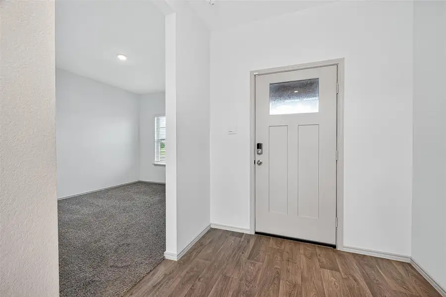 The first-floor study is located at the front of the house, just inside the entrance.