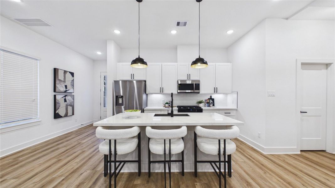 Furnished interior view inside a new home in Reynolds Landing, Houston (Image 13). Furnished interior view inside a new home in Reynolds Landing, Houston (Image 13).
