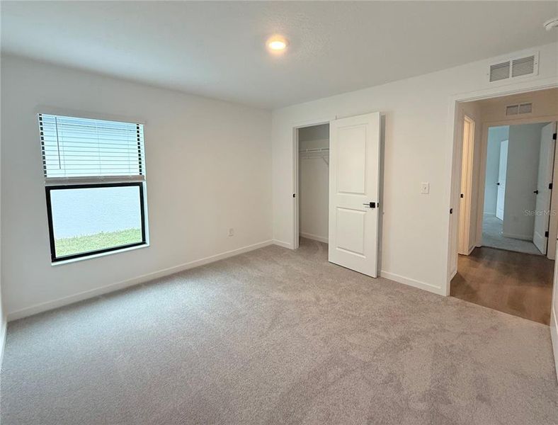 Spacious, unfurnished interior of a new home in The Crossing at Palm River, Tampa (Image 11).