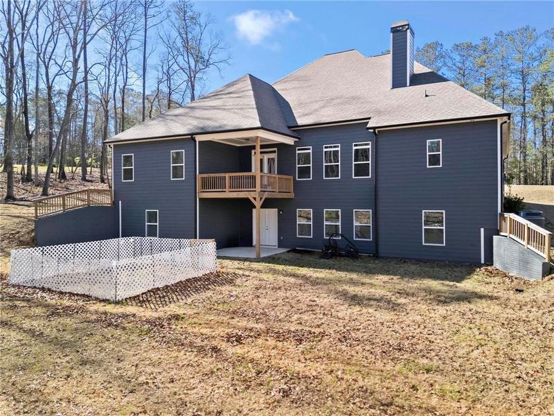 Front exterior of a new home in Dorsett Bridge, Douglasville, GA, highlighting curb appeal (Image 23).