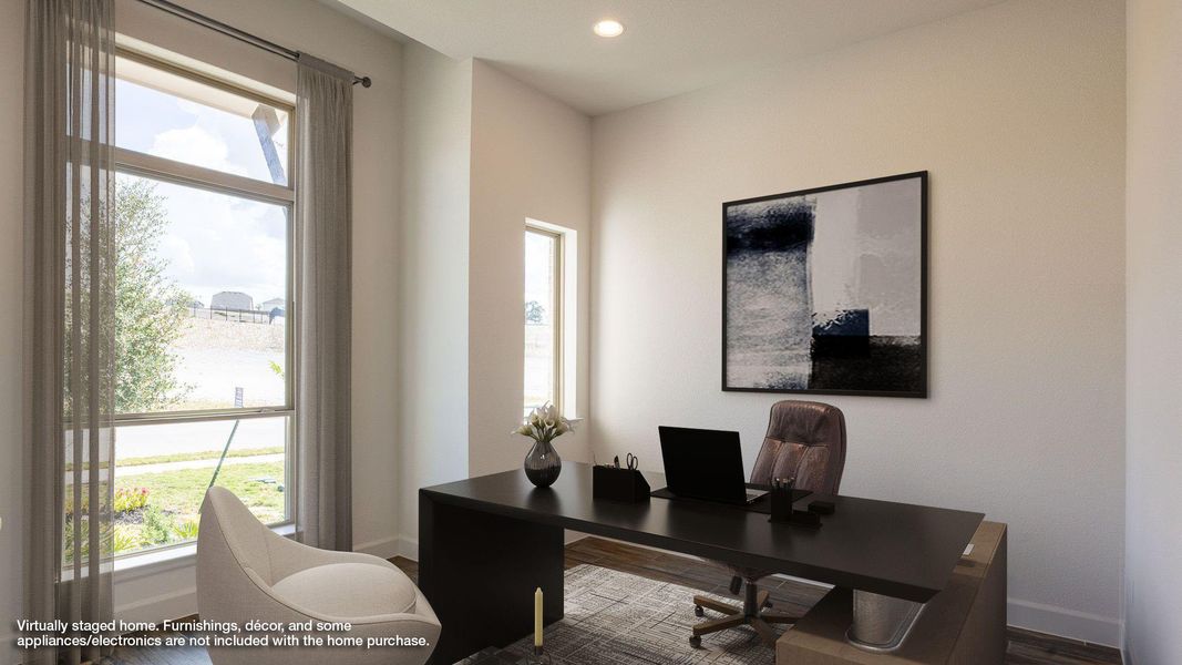 Office space featuring healthy amount of natural light, wood finished floors, and recessed lighting Office space featuring healthy amount of natural light, wood finished floors, and recessed lighting