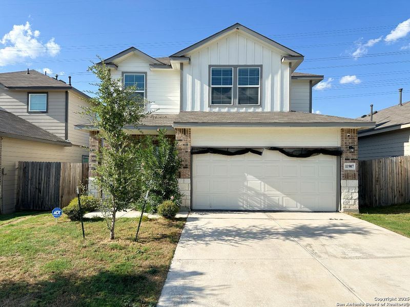 Front exterior of a new home in Stoney Creek, San Antonio, TX, highlighting curb appeal (Image 16). Front exterior of a new home in Stoney Creek, San Antonio, TX, highlighting curb appeal (Image 16).