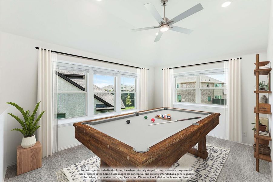 Game room with wood pool table, ceiling fan, and large windows overlooking neighborhood Game room with wood pool table, ceiling fan, and large windows overlooking neighborhood