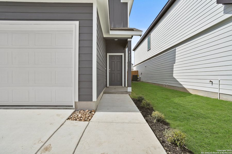 Exterior details and patio area of a home in Melissa Ranch, San Antonio (Image 4). Exterior details and patio area of a home in Melissa Ranch, San Antonio (Image 4).