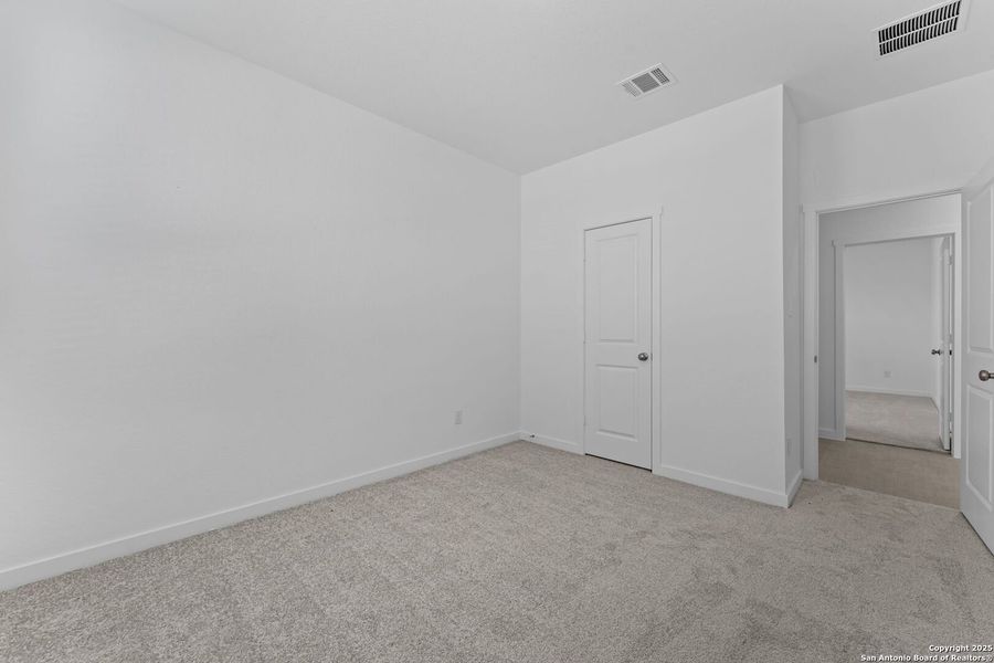 Spacious, unfurnished interior of a new home in Waterwheel: Coastline Collection, San Antonio (Image 21).