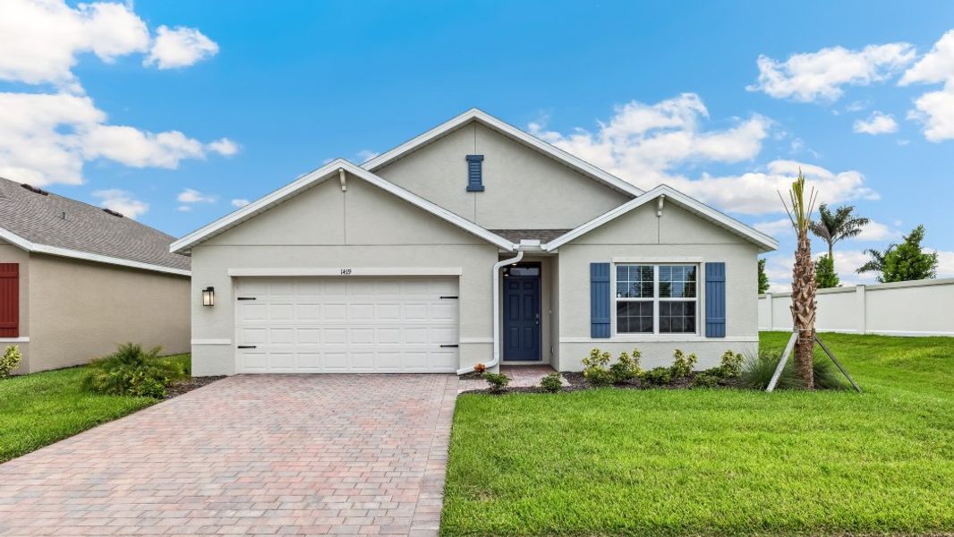Front exterior of a new home in Bentley Crossing, Fort Myers, FL, highlighting curb appeal (Image 1).