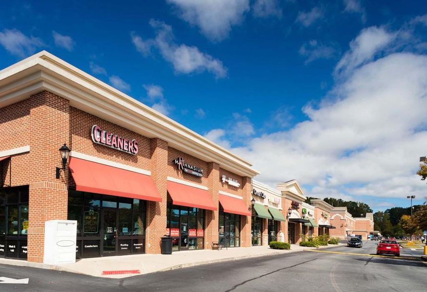 Front exterior of a new home in , Canton, GA, highlighting curb appeal (Image 2).