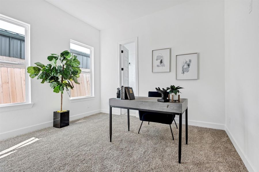 Endless possibilities await in this flexible space! Carpeted for comfort and bathed in natural light, perfect for a home office, playroom, or cozy lounge. (Representation of previously built homes. Actual colors and finishes will vary.) Endless possibilities await in this flexible space! Carpeted for comfort and bathed in natural light, perfect for a home office, playroom, or cozy lounge. (Representation of previously built homes. Actual colors and finishes will vary.)