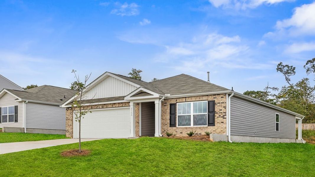 Front exterior of a new home in Ravencrest, Roebuck, SC, highlighting curb appeal (Image 2). Front exterior of a new home in Ravencrest, Roebuck, SC, highlighting curb appeal (Image 2).